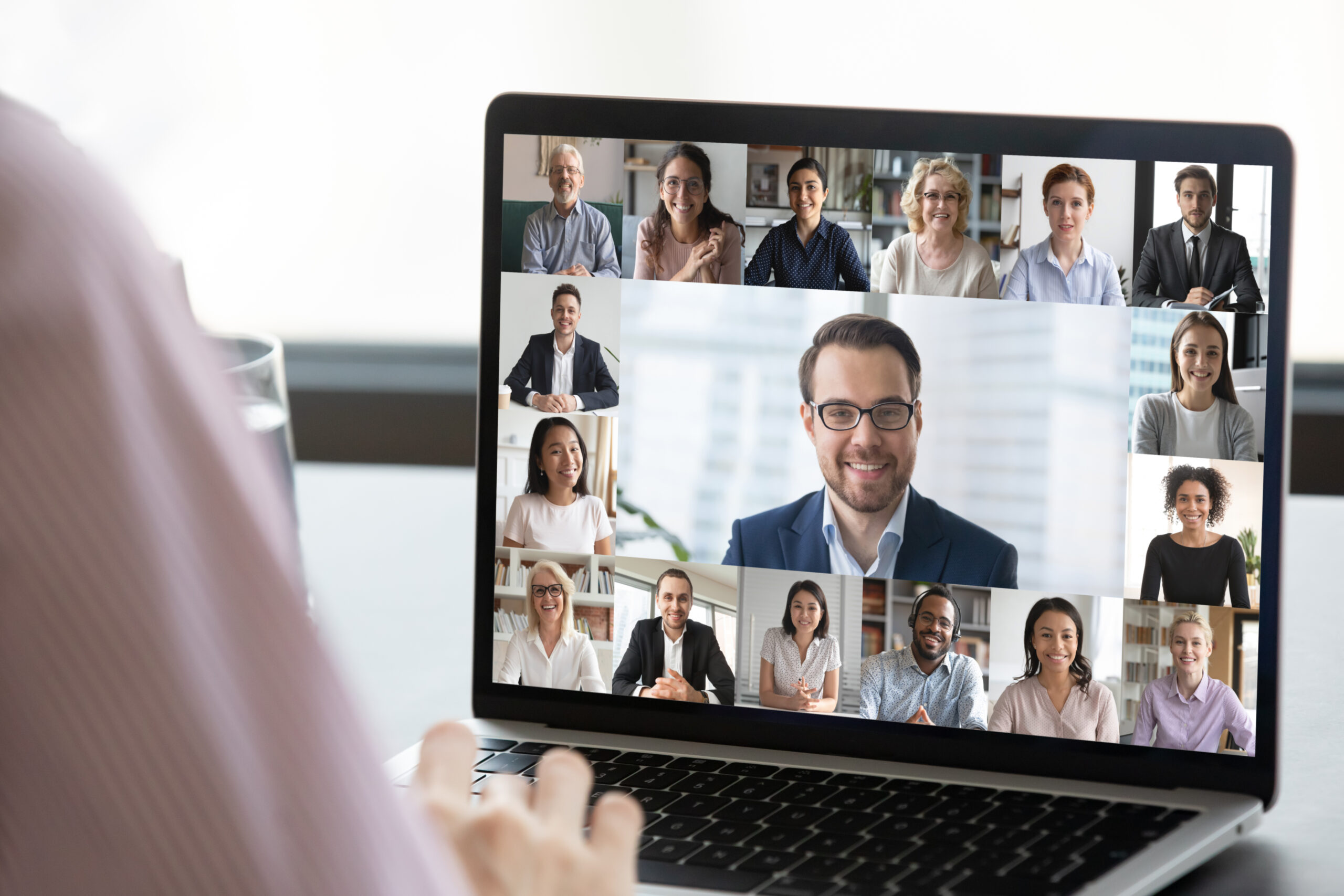 Video call on laptop with diverse people